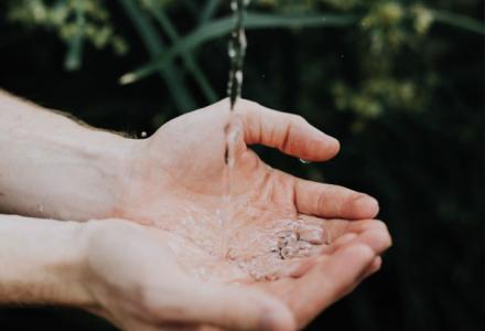 Water running into hands