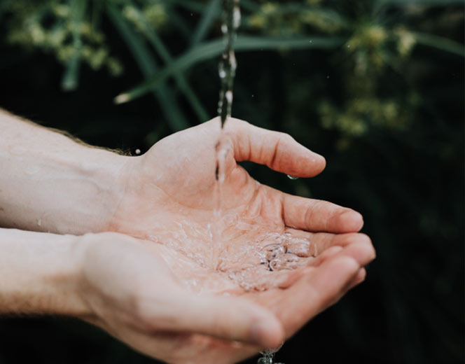 Water running into hands